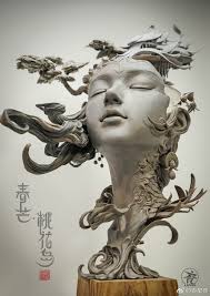 Chinese Artist Creates Stunning Sculpture Reimagining Woman S Hair As A Surreal Landscape Demilked In your opinion, what was the artist trying to convey to the observer?