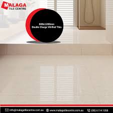 Make Your Bathroom A Spacious One Double Charge Vitrified Tiles Adds A Richer Look To Your Interiors We Have Tile Renovation Affordable Tile Vitrified Tiles