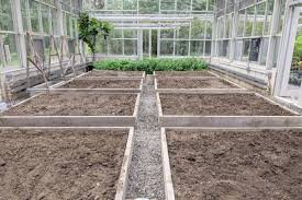 Add your soil amendments, at least a ½ thick to improve the structure of your soil, as well as the fertility level. Preparing The Vegetable Greenhouse Beds For Planting The Martha Stewart Blog