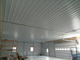 When installing your steel ceiling liner, plan on what way you are going to enter your garage, pole barn, shop, etc. Vapor Barrier Between Metal Ceiling And Fiberglass Insulation The Garage Journal Board