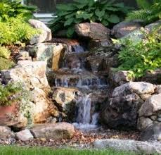 Waterfall Landscaping On The Hillside Next To Our Driveway With Images Pondless Water Features Waterfalls Backyard Water Features In The Garden