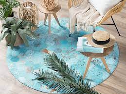 Warme und ineinander übergehende farbtöne sorgen für ein harmonisches design. Teppich Kuhfell Turkis O 140 Cm Patchwork Kurzflor Zeytin Beliani De