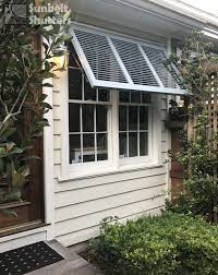 Shade Window With Wood Bahamas Shutter Awning Shutters Exterior Bahama Shutters House Paint Exterior