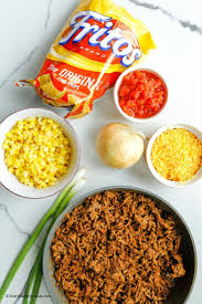 Place seasoned meat on top of fritos. Frito Taco Casserole Everyday Shortcuts