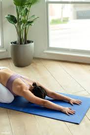Download Premium Image Of Fitness Woman In A Balasana Pose 2194511 In 2020 Fit Women Poses Curvy Yogi