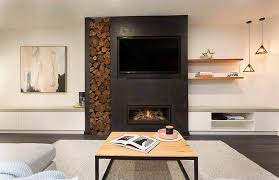 The space above is often used for hanging decorative items such as clocks, artwork, or photographs. Top 8 Fireplace Design Trends Of 2018 Photo Inspiration