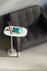 So you can use this table both as a traditional coffee table or as a laptop workstation. Serif Lift Adjustable Height Laptop Side Table Bdi Furniture
