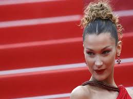 Jetting back and forth across. Bella Hadid Shares A Glimpse Of Her Life With Lyme Disease