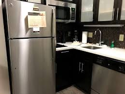 .kitchen cabinets cost to install laminate flooring replace bathtub and tiles on wall replace of cleaning carpet & upholstery by turning to the professionals at ecopure, located in the bromley area. A Large Refrigerator And Cooking Area Picture Of Staybridge Suites Miamisburg Miamisburg Tripadvisor
