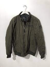 Note the open laced shoulder details and embossed buttons. Quilted Jacket Smog L Secondhand Netflea Com
