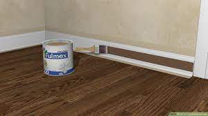 Installing baseboard trim serves as a visual anchor for any room. How To Install Baseboards With Pictures Wikihow