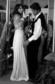 Getty the rise and fall of the flamboyant designer is now the subject of the new netflix drama, halston, with ewan mcgregor in the lead role, which drops on wednesday 14th may. Roy Halston Frowick Fashion Designer In The 1970s Toniandguy 70s Halston Dress 70s Fashion Fashion