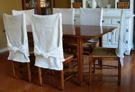 In a soft, floral pattern embossed knit the stretch slipcover stretches up to 40% to conform to your dining room chair. 130 Dining Room Chair Covers Ideas Dining Room Chair Covers Chair Covers Home Decor