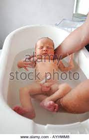 If your perusing baby bedding you are probably falling into one of two categories; Peacefull Newborn One Day Old Baby Boy Having His First Bath Stock Photo Alamy