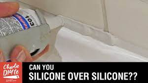 Removing silicone from shower tiles can be a hassle. Can You Silicone Over Existing Silicone Youtube