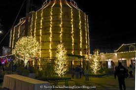 Experience Christmas At The Silos At Magnolia Market See The Silos All Lit Up In Their Christmas Finest Magnolia Market A Silos Magnolia Silos Harp Design Co