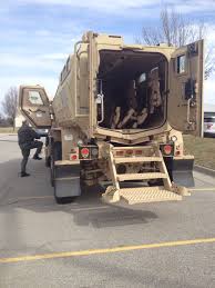 Story County Sheriff Paul Fitzgerald Climbs Inside The Mine Resistant Ambush Protected Vehicle Or Mrap Which Wh Fire Trucks Armored Vehicles Military Surplus