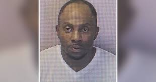 Man accused of hitting bicyclist with car after argument over $1