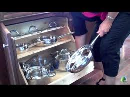 Organize Pots And Pans With Timberlake Cabinetry The Base Pot And Pan Organizer Features Three Shelves Of S Pan Organization Pots And Pans Timberlake Cabinets