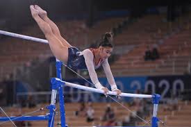 Uneven bars champion and balance beam silver medalist; Krrvzguw8yierm