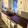 Butcherblock simply refers to countertop or island top constructed of solid hardwood strips or squares glued together. 1