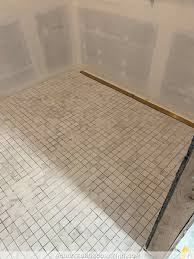 Tiling Our Large Curbless Shower Floor - Addicted 2 Decorating®