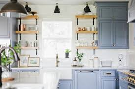 Farmhouse kitchen cabinets mostly made from wood material, ranging from solid wood to cardboard. Farmhouse Sink With Blue Shaker Cabinets Cottage Kitchen