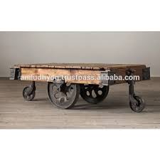 Vintage industrial rustic rolling cart made of wood planks and cast iron wheels and brackets, the loader has two end wheels that swivel and are slightly shorter than the larger sides ones for easier movability. Industrial Vintage Cart Coffee Table Buy Industrial Vintage Cart Coffee Table Industrial Coffee Table Industrial Cart Coffee Table With Cast Iron Wheels Product On Alibaba Com