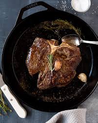 Season steaks generously then rub with 1⁄2 of the oil. T Bone Steak With Garlic And Rosemary Recipe Kitchen Swagger