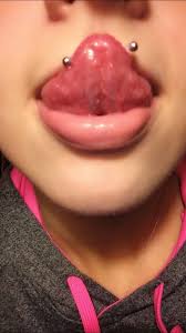 When you stick out your tongue, the jewelry ends will look a bit like snake eyes, and your tongue might resemble a snake peeking out of your mouth. Tongue Snake Eyes Piercing