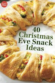 From baked meatballs to healthy spinach artichoke dip. The Tastiest Most Festive Snacks To Serve On Christmas Eve Christmas Eve Appetizers Christmas Snacks Christmas Cooking