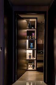 home tour this dark and cosy 2 bedroom condo under 30k is a bachelor s dream house tours mirror panels grey walls