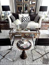 Wallpaper is a purple living room idea that adds an abstract beauty to a space that is otherwise adorned with silver and white. Black White And Silver Living Room Decor Home Decoration Design Ideas