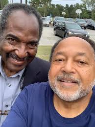 Out in about With South Carolina and Aiken Finest, Congressman James  Cyburn, Representative William Cyburn and the legend Himself Coach Jackson.  And their Message is Please go out and Vote!