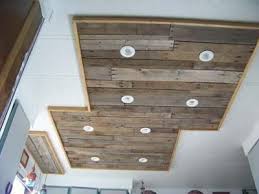 The best thing about these designs is that these are so simple and can be easily manipulated to create the most incredible wall as well as ceiling designs. Inexpensive Kitchen Light Upgrade Using Pallet Wood Wood Ceiling Lights Wood Pallets Pallet Ceiling