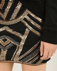 Jupe longue et plissée, à imprimé cachemire recouvert de sequins. Mini Jupe A Sequins Dore 690436g06a00 Pimkie