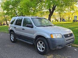 Image result for Satin Silver 2003 Escape