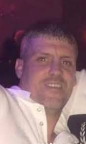 Can someone edit out the background of this wedding photo?