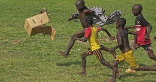 cardboard box soccer ball kids playing happy kids african children