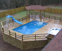 Swiming Pools Above Ground Pool Deck Design With Pool Spa Also Pool Slide And Wooden Fence Besi Pool Deck Plans Swimming Pool Decks Above Ground Swimming Pools