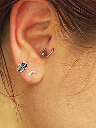Help Does Anyone Know How To Get This Type Of Hoop Out Of A Tragus Piercing See Comments For More Info Piercing