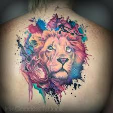 The lion is a popular tattoo design for men who want bold and masculine ink. Watercolor And Realism Integrated Lion And Rose Back Piece By Haylo Tattoonow