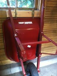 If you hang the wheelbarrow on the wall, you can protect the wheelbarrow and yourself by making sure you get the right brackets and select a good location. 28 Brilliant Garage Organization Ideas With Pictures Garage Storage Garage Organization Wheelbarrow Storage