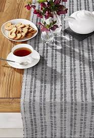 Our Extra Wide Jonas Table Runner Covers More Ground In Decorating Your Table With Artisan Style Made Of Tonal Grey Yarns Table Runners Crate And Barrel Table