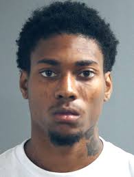 He's charged with shooting a woman during a robbery in Lakeview over the  weekend. And, despite a significant history of violent crime, he was  already