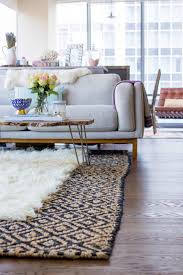 How To Layer Rugs Like A Designer Rugs In Living Room Living Room Decor Cozy Pretty Living Room