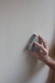 How To Smooth A Textured Wall Ehow Remodel Bedroom Small Bedroom Remodel Textured Wall