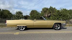 Image result for Medium Gold 1969 Cadillac