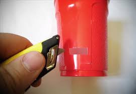 Just cut a slot into the tube and slip your phone in. Amp Up Your Cell Phone S Sound System With A Plastic Cup Macgyverisms Wonderhowto