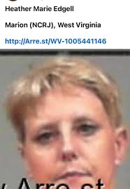 Update: 48-year-old female Heather Edgell Is charged with a fleeing DUI by  the Marion County Sheriff's Office and malicious assault times-two by White  Hall Police.